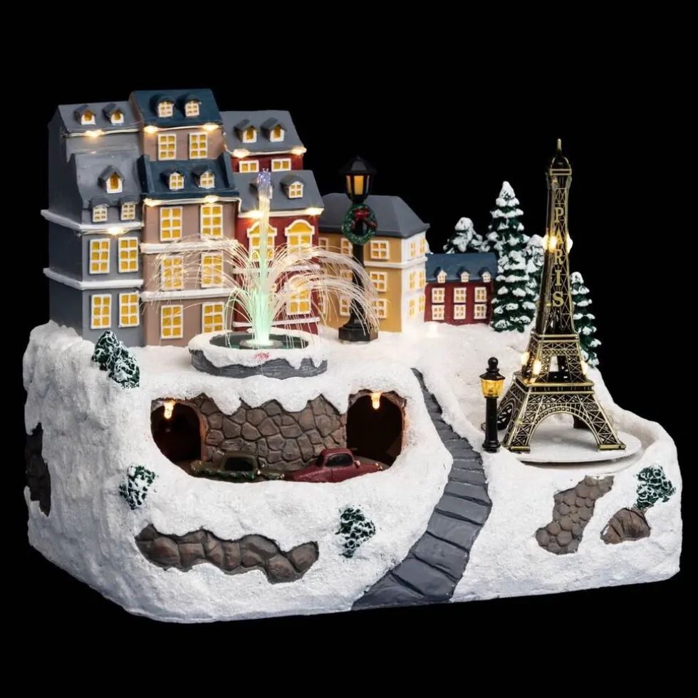 Fééric Lights and Christmas verlicht kerstdorp Eiffeltoren met fontein